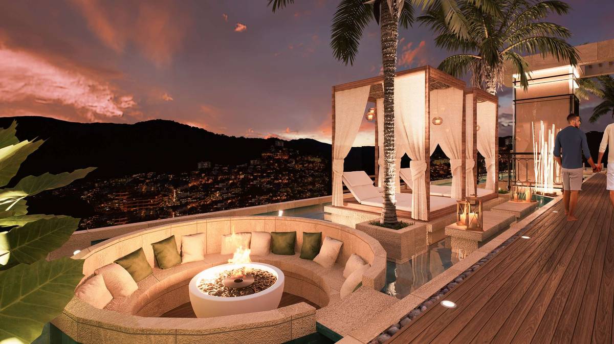 Rooftop fire pit lounge at night